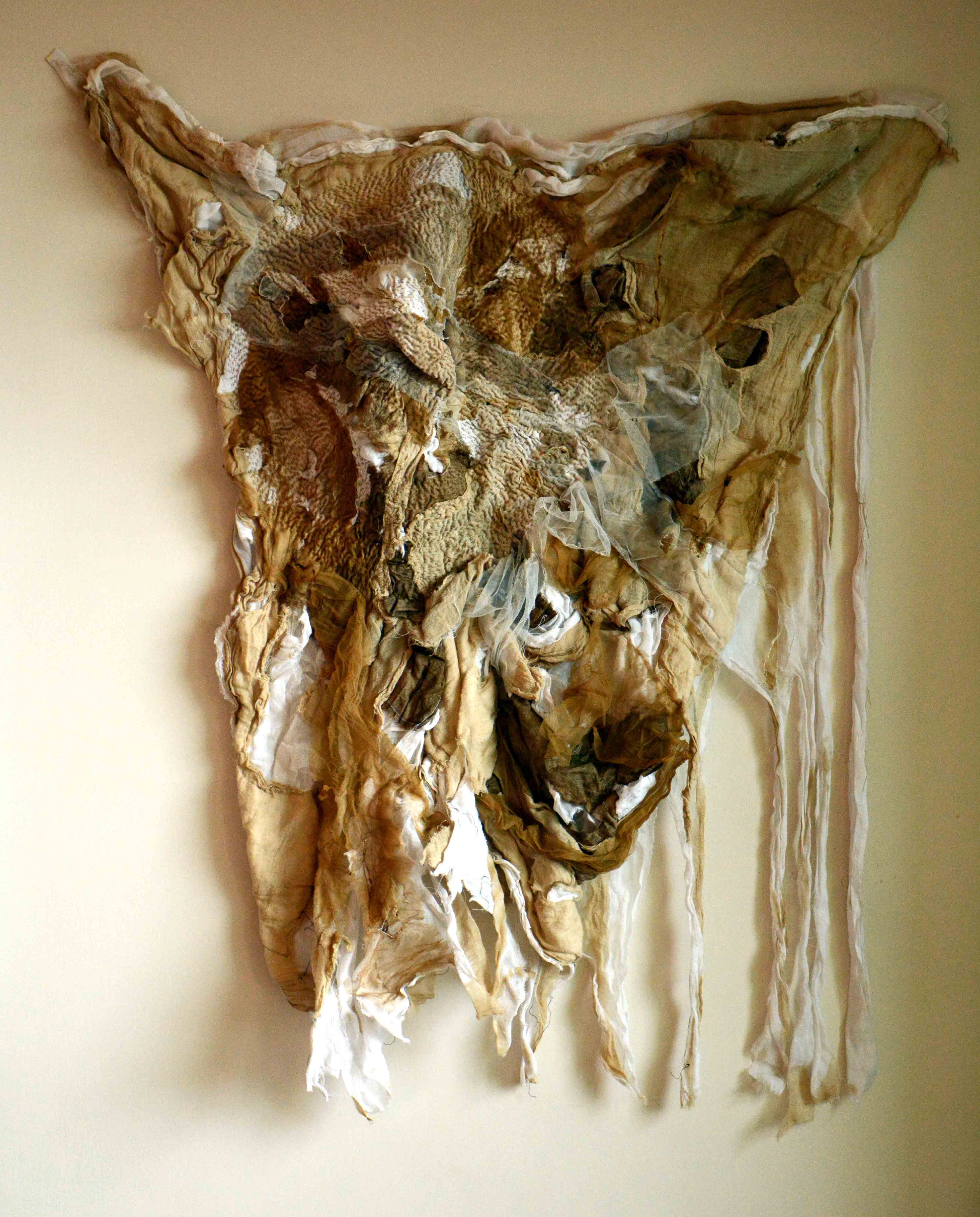 Self-doubt, 2014, [34.75 x 39 inches – unframed], Materials: cotton fabrics, cotton floss, cotton-polyester thread, Technique: burning, layering, hand-sewing, machine embroidery, staining with tea-leaves