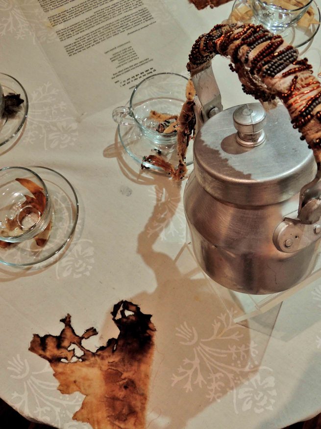 Image 6 : Display image of The Piercing Needle, Work in view: Detailed view of The Stain Tea Party, Installation, Photo credit: gopika nath